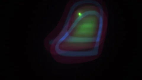 Abstract Colorful Shape Morphing on Black Background with Glowing Green Par.. Stock Footage 343685388