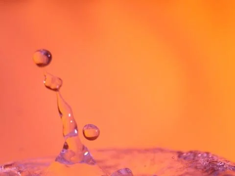 Abstract Colors colliding drops different fluids funds forms 写真素材