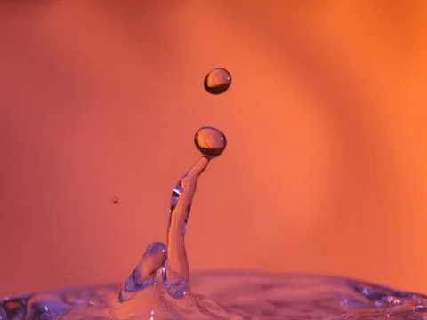 Abstract Colors colliding drops different fluids funds forms Stockfoto's