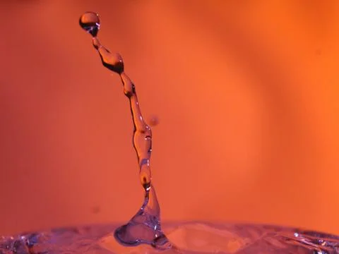 Abstract Colors colliding drops different fluids funds forms Stock Photos