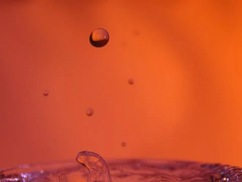 Abstract Colors colliding drops different fluids funds forms Stock Photos