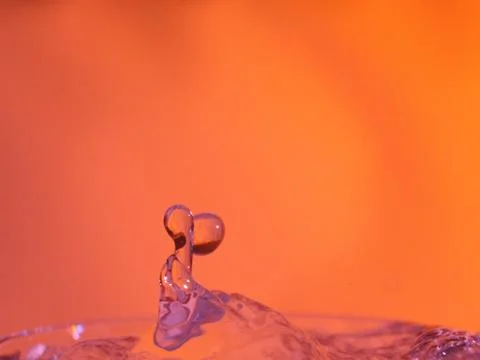 Abstract Colors colliding drops different fluids funds forms Stock Photos