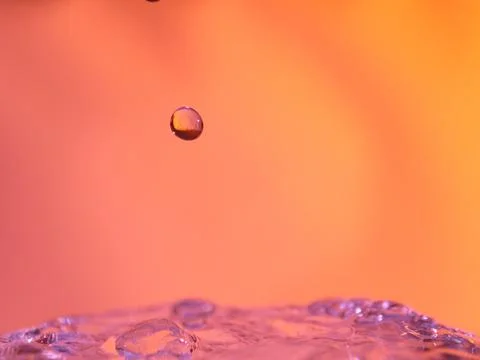 Abstract Colors colliding drops different fluids funds forms Stock Photos