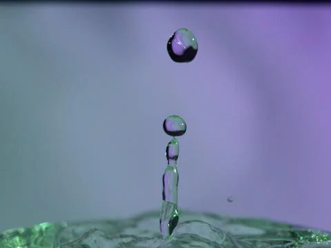 Abstract Colors colliding drops different fluids funds forms Stock Photos