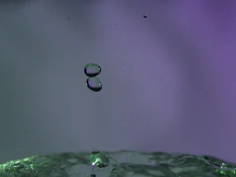 Abstract Colors colliding drops different fluids funds forms Stock Photos