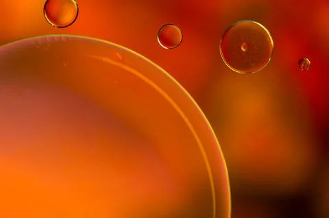 Abstract colourful bubbles. Soft background with orange sunrise color circles. Stock Photos