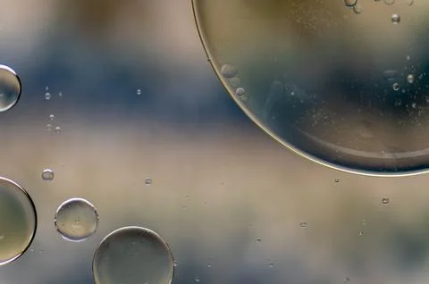 Abstract colourful bubbles. Soft background with blue and soft yellow colors. Stock Photos