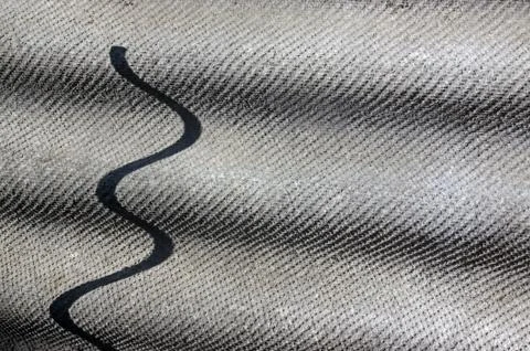 Abstract composition on a background sheet ribbed slate Stock Photos