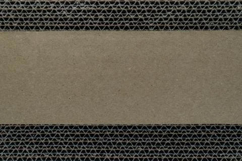 Abstract composition of beige pattern of corrugated cardboard background Stock Photos