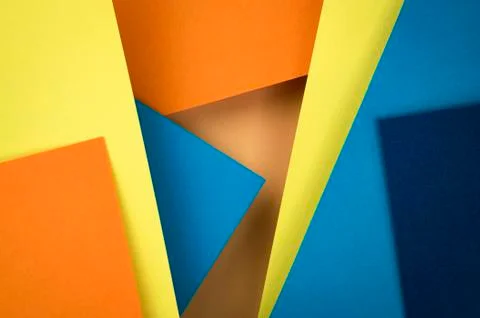 Abstract composition of blue and orange papers 库存照片
