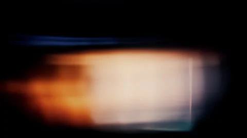 Abstract composition with blurred, soft transitions between warm orange and cool Stock Footage 297531030