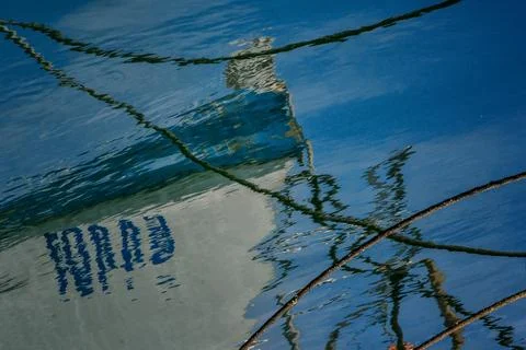 Abstract Composition of Boat Reflection on Water Stock Photos