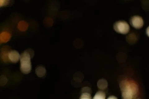 Abstract composition capturing a mesmerizing dance of blurry light particle.. Stock Photos