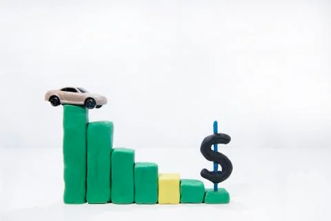 Abstract composition of car prices in auto-market. Isolated on white backgrou Stock Photos