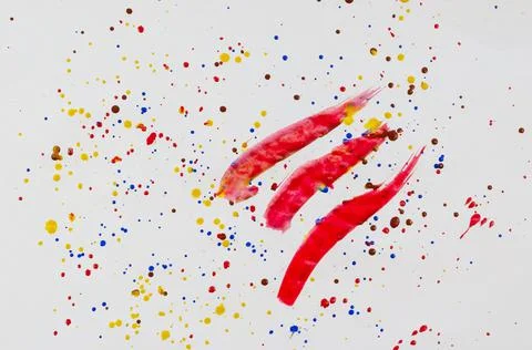 Abstract composition. Chaotic drops and smears of paint on white paper. Yello Stock Photos