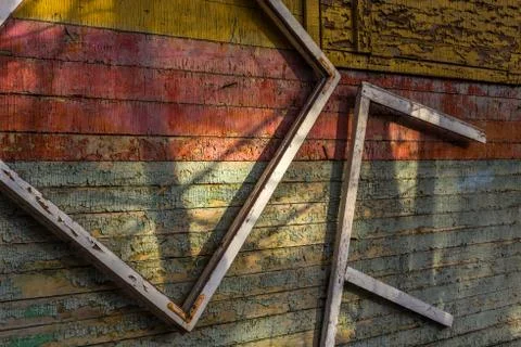 Abstract composition with a frames on old wooden wall Stock Photos