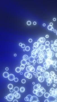 Abstract composition of glowing blue particles resembling floating bubbles .. イラスト素材