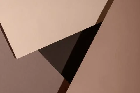 Abstract composition of layered paper textures in soft neutral tones with g.. Stock Photos