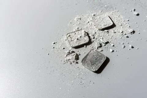 Abstract composition made from crushed grey eye shadows Stock Photos