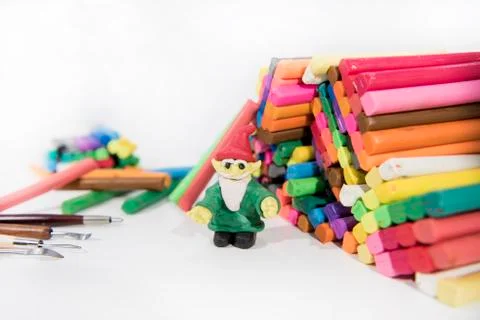 Abstract composition of making something from plasticine (play clay) Stock Photos