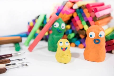 Abstract composition of making something from plasticine (play clay) Stock Photos