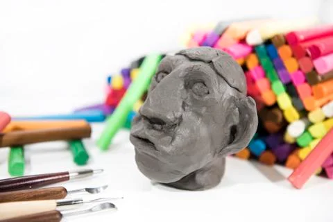 Abstract composition of making something from plasticine (play clay) Stock Photos