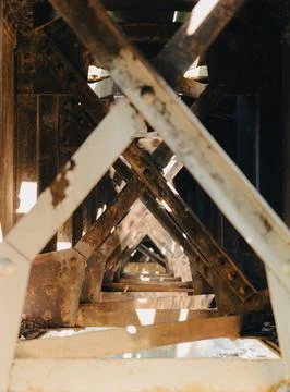 Abstract composition of the metal structure of an old bridge Photos