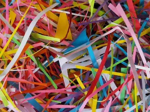 An abstract composition of multi-colored paper pieces, colorfull background Stock Photos