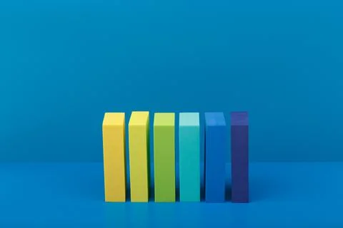 Abstract composition with multicolored rectangular figures on blue background 스톡 사진