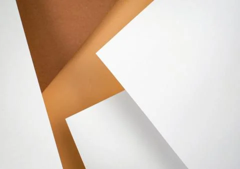 Abstract composition of ocher white papers Stock Photos