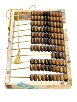 Abstract composition from the old abacus, coins and shells isolated on white  Stock Photos