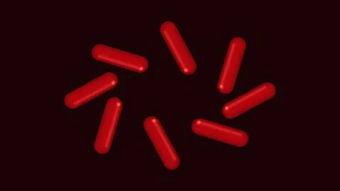 Abstract composition of red capsules arranged in a circular radiating patte.. Stock Footage 347464810