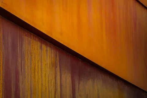 Abstract composition of rust and orange metal panels Stock Photos