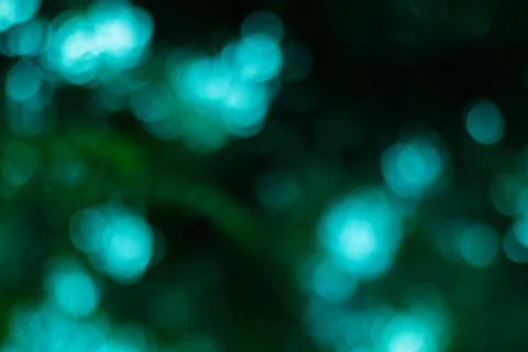 Abstract composition with soft, blurred points of light in tones of green a.. Stock Photos