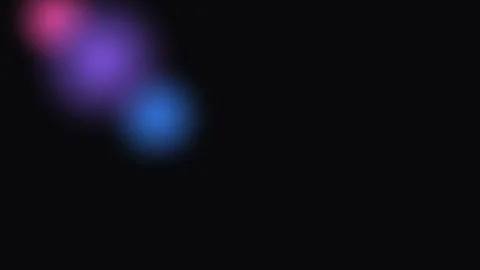 Abstract composition of soft glowing pink purple and blue light orbs on black 库存影片 338310818