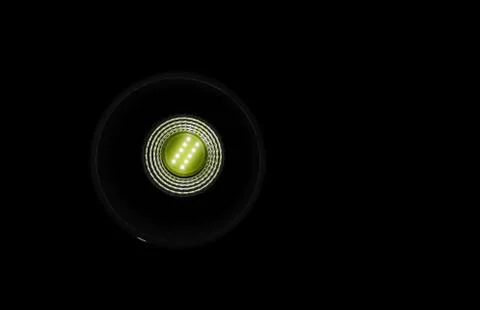 Abstract composition as wallpaper of a led bulb on black background 스톡 사진