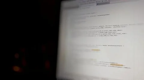 Abstract computer script code. Programming code screen of software developer. 库存照片