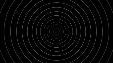 Abstract concentric circles pattern in dark background with copy space for .. Stock Footage 340943579