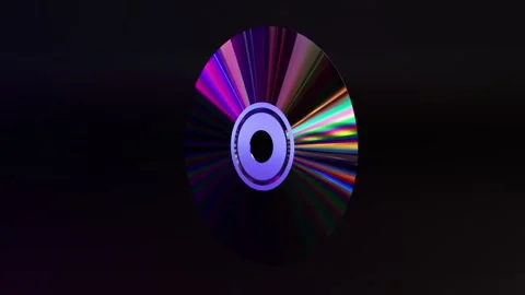 Abstract concept. CD DVD disc on a black isolated background. Neon blue purple Video stock 251538032