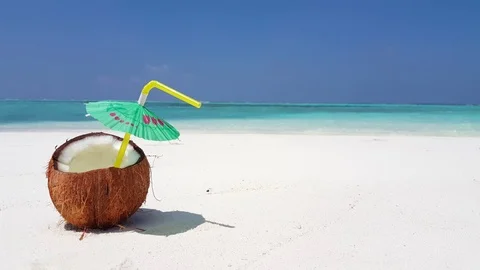 Abstract concept, cocktail in coconut shell with straw and cocktail Stock Footage 118435686