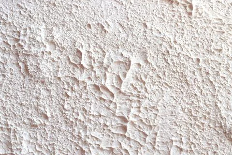 Abstract concrete background - in the form of a rough, creased wall Stock Photos