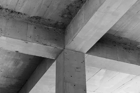 Abstract concrete interior background, ceiling construction with girders Stock Photos