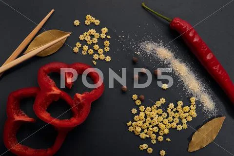 Abstract cooking pepper, spices and Chinese sticks Stock Photos