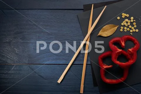Abstract cooking pepper, spices and Chinese sticks Stock Photos