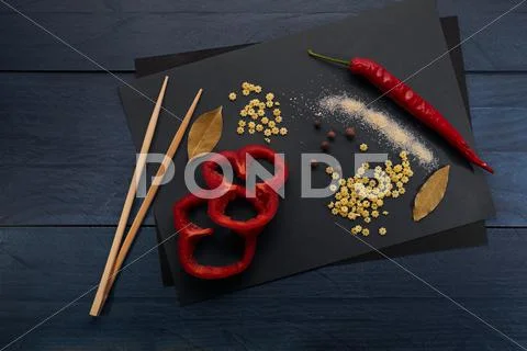 Abstract cooking pepper, spices and Chinese sticks Stock Photos
