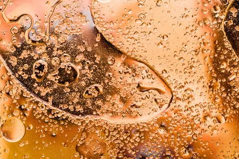 Abstract copper gold liquid drop texture background Stockfoto's