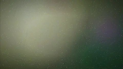Abstract cosmic background with floating dust particles and soft glowing light 스톡 동영상 345764359