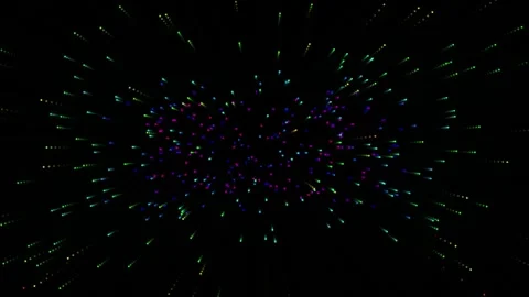Abstract cosmic explosion of colorful light particles against a dark backgro 库存影片 318893890