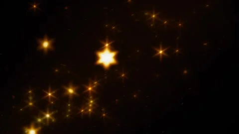 Abstract cosmic light particles swirling in space. Dynamic golden starburst moti Stockbeeldmateriaal 340456759
