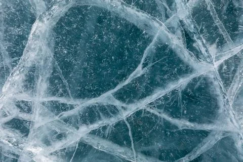 Abstract cracked ice texture background with frosty patterns and copy space Stock Photos